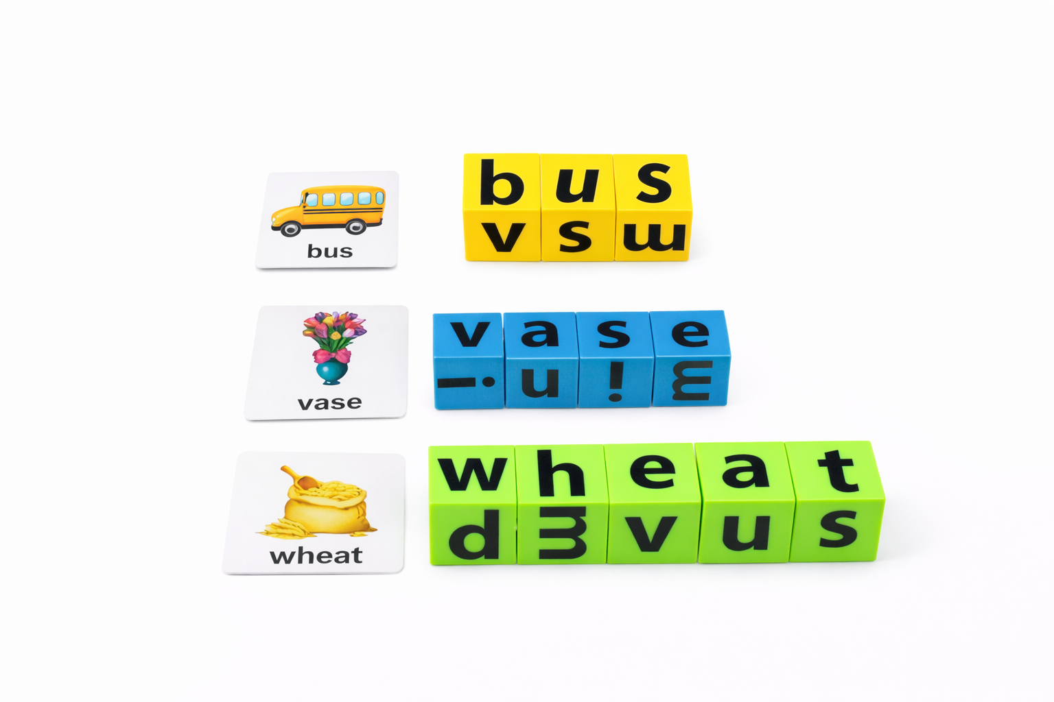 Educational letter blocks with word cards on a white background